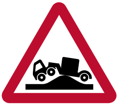 Long low vehicles may be at risk of grounding; drivers of such vehicles must phone before crossing